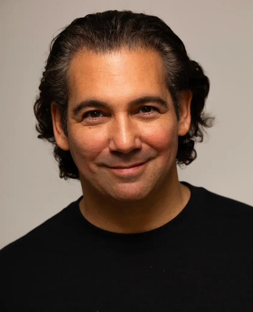 Steven Wolfe Pereira Headshot in black tshirt
